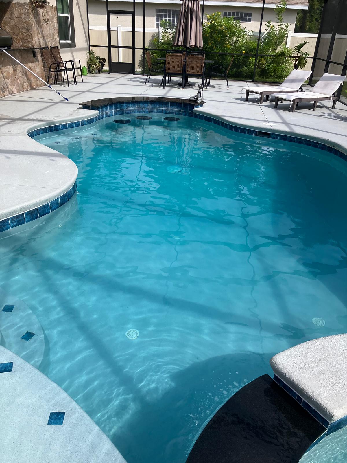 A sparkling clean pool maintained by Pristine Pools of Flagler in Palm Coast, FL